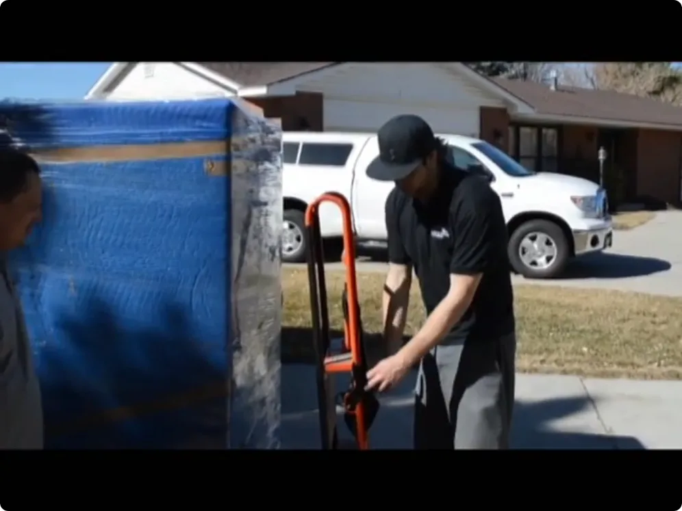 Moving crew handling protected household items